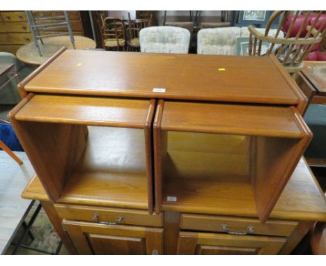 A RETRO TILE NEST OF THREE TABLES