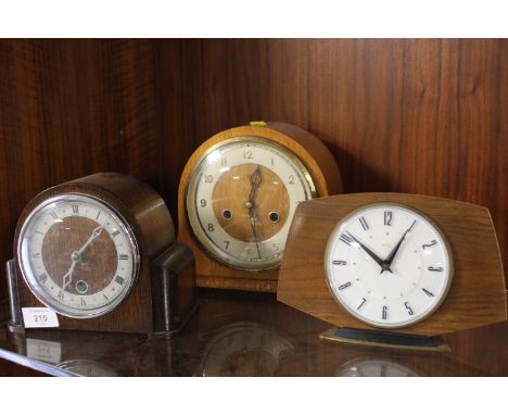 A VINTAGE DECO METAMEC MANUAL WIND DESK CLOCK TOGETHER WITH TWO MANTLE CLOCKS (3)