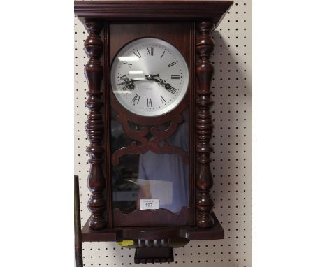 A MODERN 31 DAY MAHOGANY WALL CLOCK 
