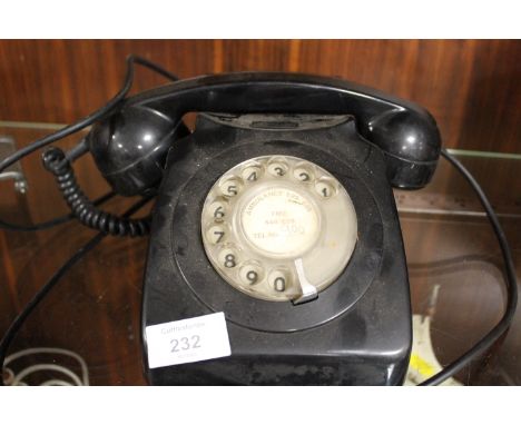 A VINTAGE BLACK TELEPHONE 