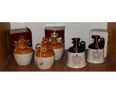 Munro's King Of Kings Rare Old De Luxe Scotch Whisky (blended); three ceramic flagons; together with Grant's Deluxe Scotch bl