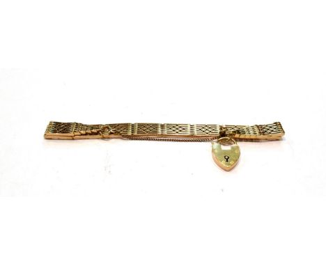 A gate link bracelet, stamped '15CT', length 19cm .  Gross weight 26.3 grams. 
