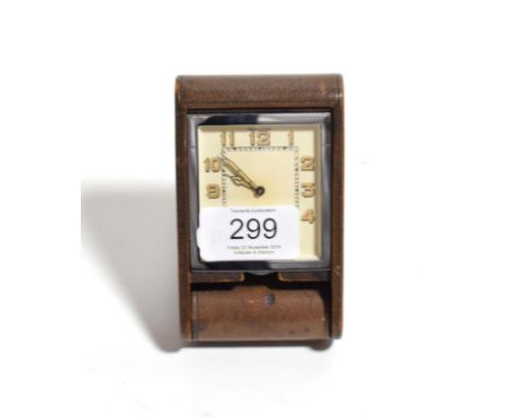 An Art Deco Jaeger-LeCoultre travel clock, Arabic dial, leather folding case, 11cm high