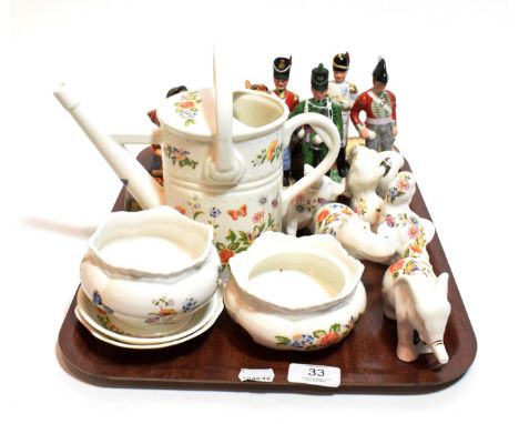 A collection to include miniature Staffordshire dogs, Goebel, Lladro and Aynsley ware