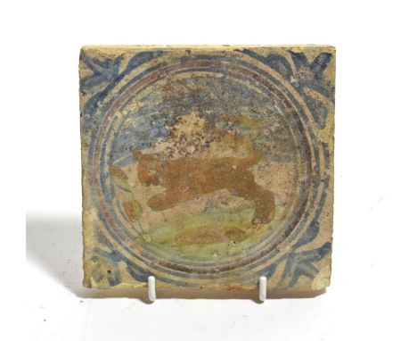 An English or Dutch tile, 17th century, decorated with wild animals within circular border, labelled to reverse, found on sit