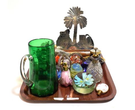 A collection of various paperweights, including Caithness and others, together with three scent bottles, a Victorian green gl