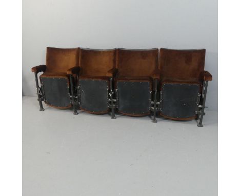 A row of four vintage folding cinema seats. Overall length 212cm, height 80cm, depth (folded) 44cm.Each seat measures - width
