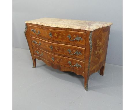 A French Louis XV style serpentine fronted kingwood and marble topped commode chest of three long drawers, with brass ormulu 