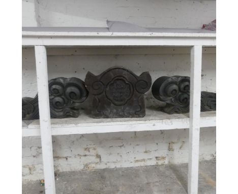 Three Japanese glazed ceramic garden wall ornaments. Central piece - width 45cm, height 36cm, depth 23cm.The scrolled pieces 