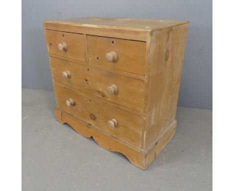 A vintage pine chest of two short and two long drawers. Width 87cm, height 82cm, depth 50cm.