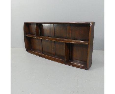 ERCOL - A dark elm two-tier hanging shelf, with blue maker's label. 107cm, height 49cm, depth 12cm.