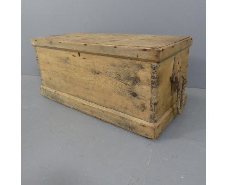 An antique pine seaman's trunk, with spliced rope handles. Width 94cm, height 43cm, depth 43cm.