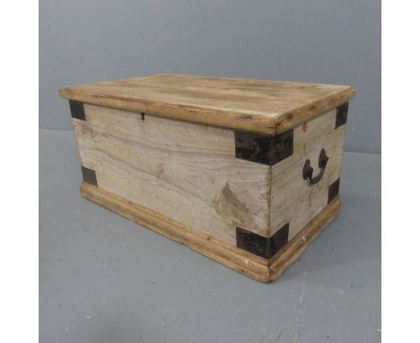 A vintage metal bound pine chest. Width 68cm, height 33cm, depth 38cm.