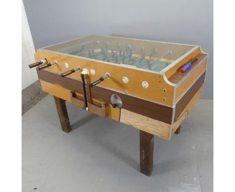 A vintage Garlando "Soccer Football Game" table. Length 145cm, height 94cm, depth 78cm (handles reaching to 188cm).Some signs