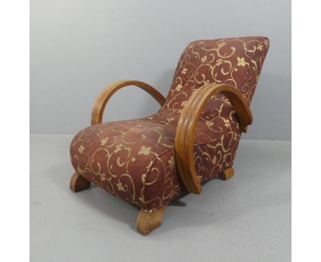 An original Art Deco Heals design banana lounge chair with bent wood arms, possibly original printed canvas upholstery.