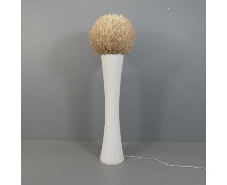 A late 20th century sea urchin design floor lamp, the waisted cylindrical composite base supporting a large spherical shade, 