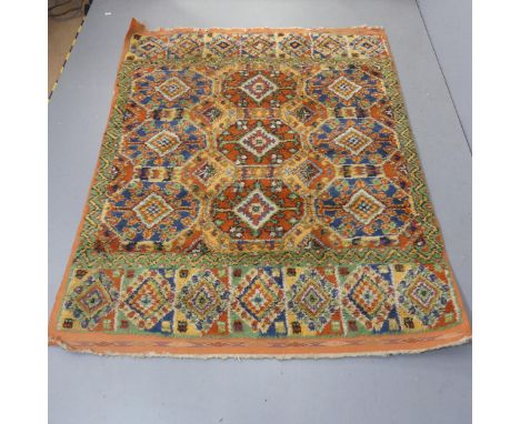 A large orange-ground tufted wool carpet. Length 225cm, width 175cm.