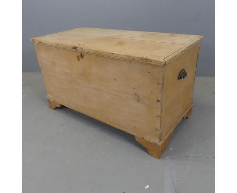 A vintage pine blanket box. Width 95cm, height 52cm, depth 48cm.