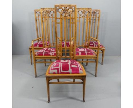 A set of six Italian Art Nouveau design dining chairs by Medea, the legs rising to a high backrest with organic curved design