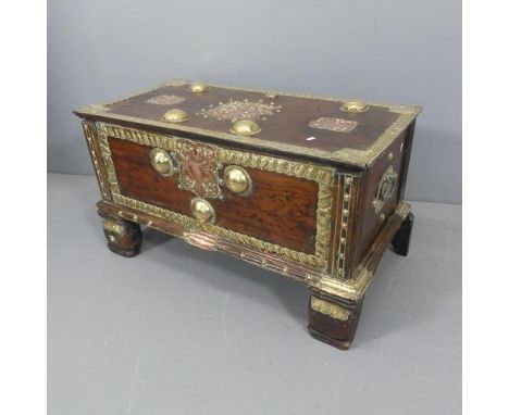 An 18th century eastern / Batavian padouk-wood spice box on stand, decorated with brass and copper mounts, marked for the Dut