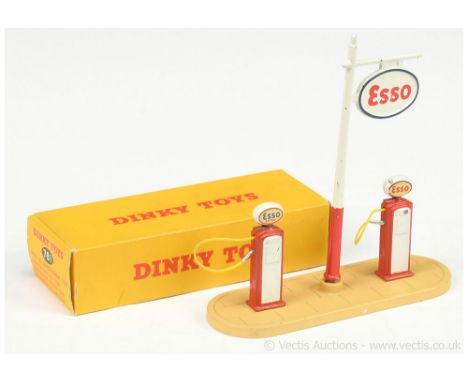 Dinky 781 "Esso" Petrol Pump Station Set comprising cream base, 2 x red and white "Esso" petrol pumps complete with sign - de