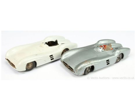 JNF (Germany) a pair of large tinplate Mercedes Silver Arrow Racing Cars - both are friction drive (1) metallic grey with tin