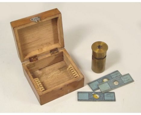 POCKET MICROSCOPE. A German universal pocket microscope with three slides &amp; instruction leaflet.
