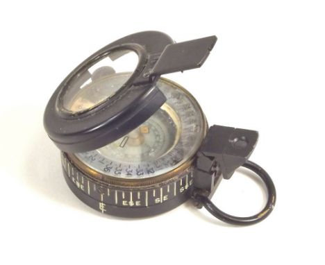 WWII COMPASS. A WWII field compass, marked 'T.G.Co.Ltd., London. No. B20084. 1940. Mk.III.