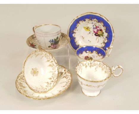 COALPORT. An 18th century Coalport trio &amp; two hand painted cups &amp; saucers.