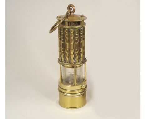 MINER'S LAMP. An American miner's safety lamp by Wolf. Height 30cm.