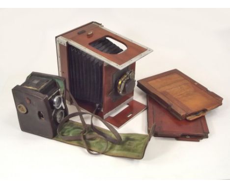 CAMERAS ETC. A 19th century Shew &amp; Co., plate camera, two mahogany plates &amp; a leather cased Compur-Rapid camera.