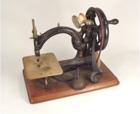 SEWING MACHINE. A Willcox &amp; Gibbs 'Automatic' silent sewing machine, sold with leaflet.