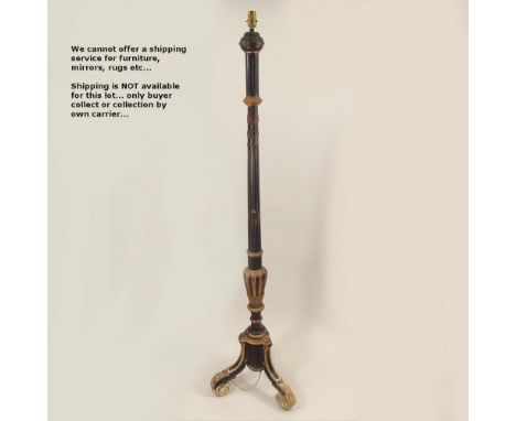 STANDARD LAMP. A gilt &amp; ebonised standard lamp. Height 161cm.