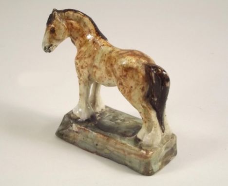STELLA R. CROFTS. A Stella Crofts pottery model of a heavy horse. Incised signature &amp; indistinct numeral (45) to base. He