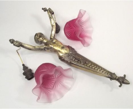 WALL LAMP. A cast metal figural wall lamp, with cranberry glass frilled shades. Height of fitment 40cm.