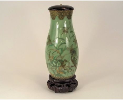 JAPANESE VASE.A 19th century Japanese celadon porcelain vase decorated with frogs amongst foliage, crickets, moths & other in