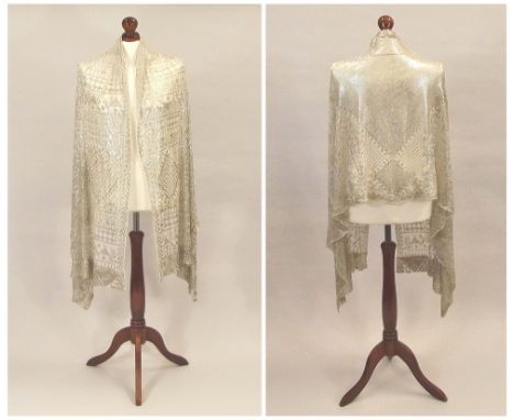 DECO STOLE. An Art Deco evening stole with silver decoration throughout. 108 x 75cm.