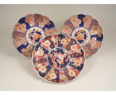 IMARI. A pair of Chinese Imari plates 21cm &amp; one other similar plate.