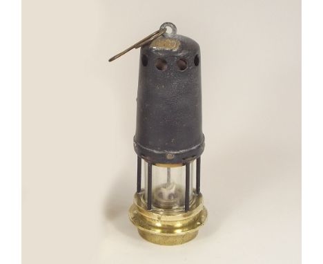 MINER'S LAMP. A miner's safety lamp by Edward Teal, Swinton. Height 26cm.