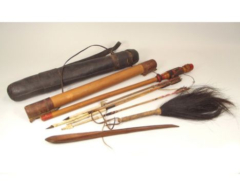 FLY WHISK ETC. A native fly whisk, a leather quiver with arrows, a carved ladle etc.