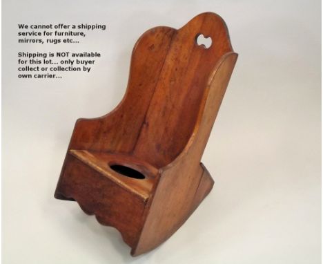 CHILD'S CHAIR. A child's Georgian, country made mahogany, rocking commode chair. Height 64cm.
