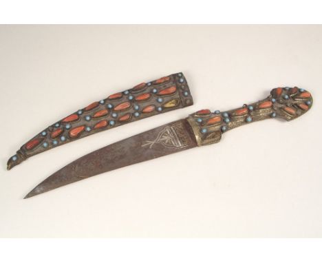 MOROCCAN DAGGER. A Moroccan gilt metal dagger, set with coral &amp; turquoise coloured stone. Length 25cm.