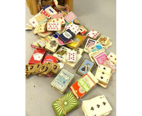 A large selection of collectable playing cards. (qty)
