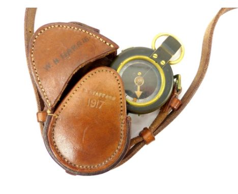 World War I officer's compass, in stamped matching leather pouch, stamped makers Stafford 1917, previous owner and by descent