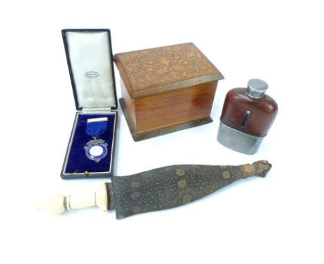 Wooden cigarette dispenser with rising mechanism, inlaid hinged lid, a leather clad hip flask and a African dagger with snake