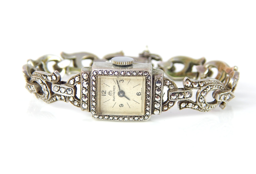 BUCHERER An antique Art Deco cocktail watch in silver and marcasite ...