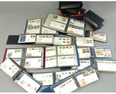 British First Day Covers, few mint blocks, in nineteen albums 