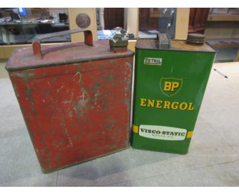 A Lightshale oil fuel can with cap and a BP Energol can
