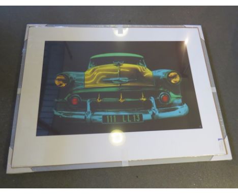 A print of a 1950's Chevrolet unframed but supplied with a frame, 60cm x 80cm   