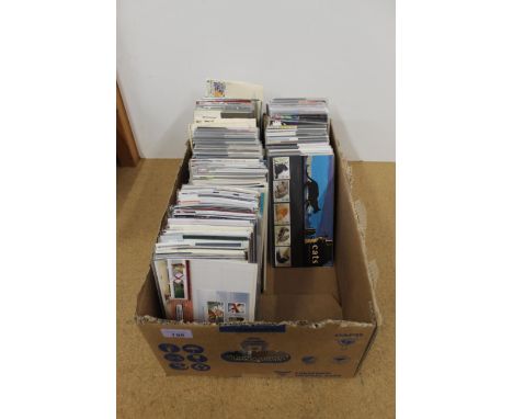 A box of loose packs of first day covers